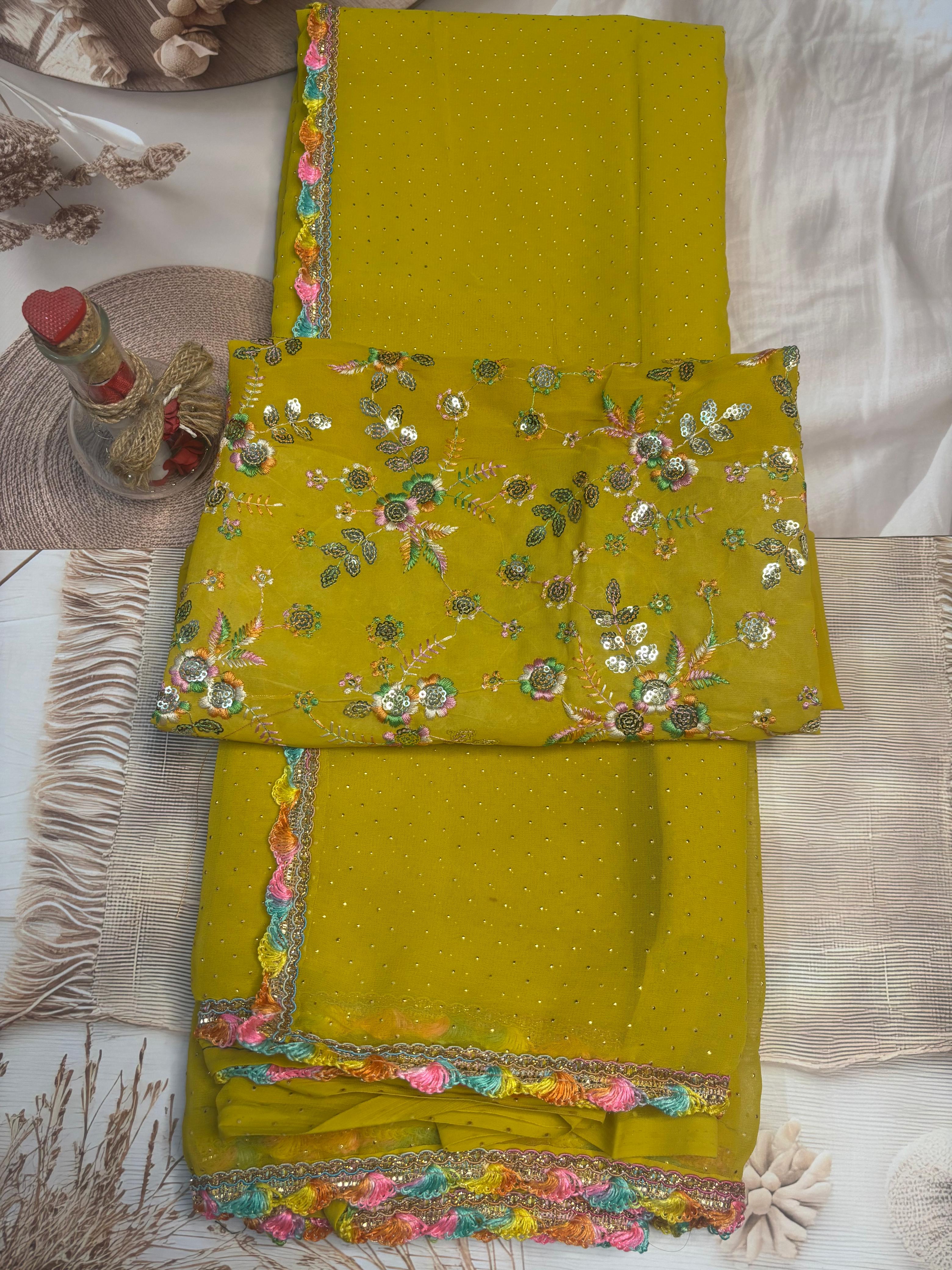 Mustard Yellow Embroidered Georgette Saree with Tassel Border