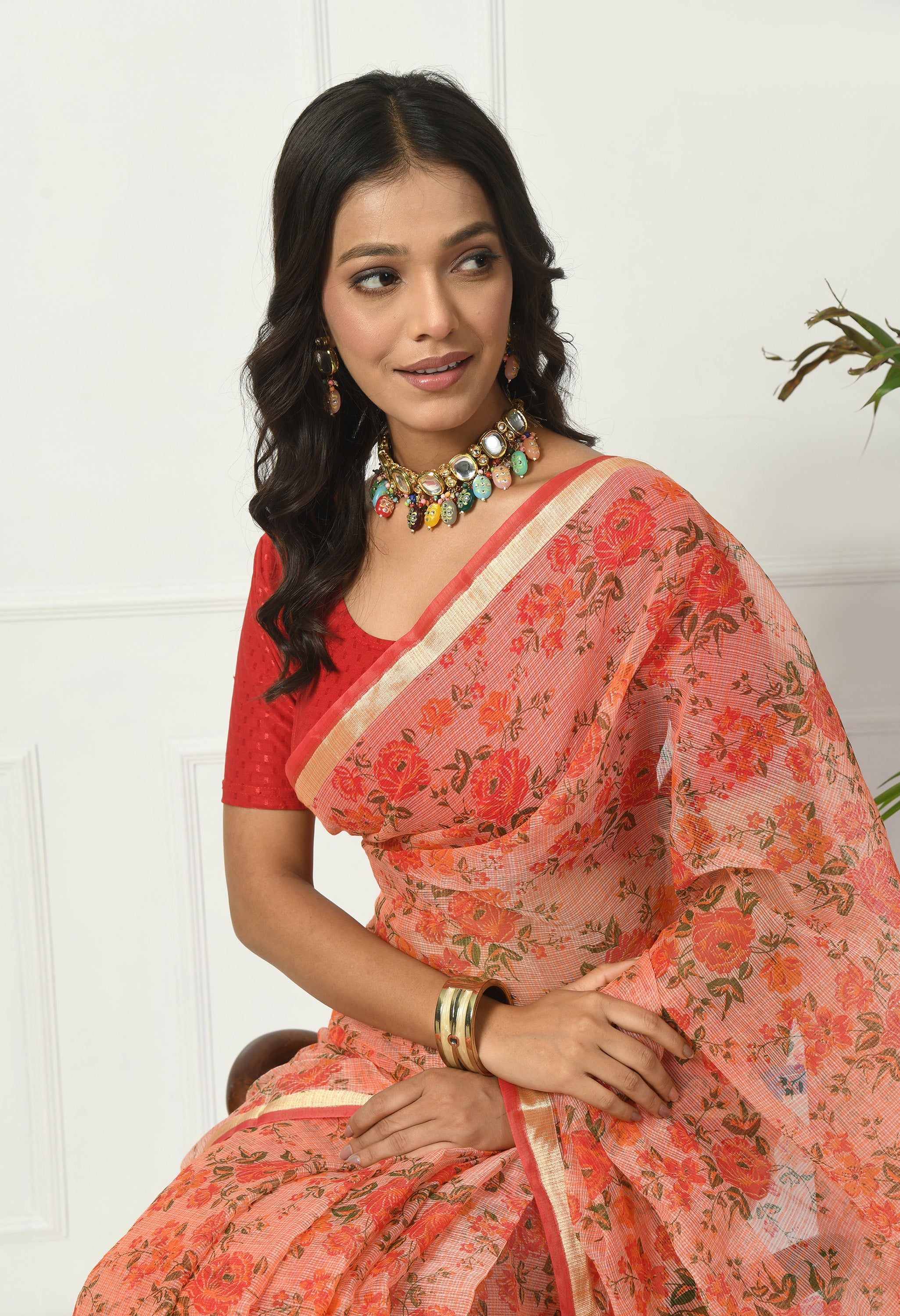Sunset Orange Cotton Saree with Floral Pattern
