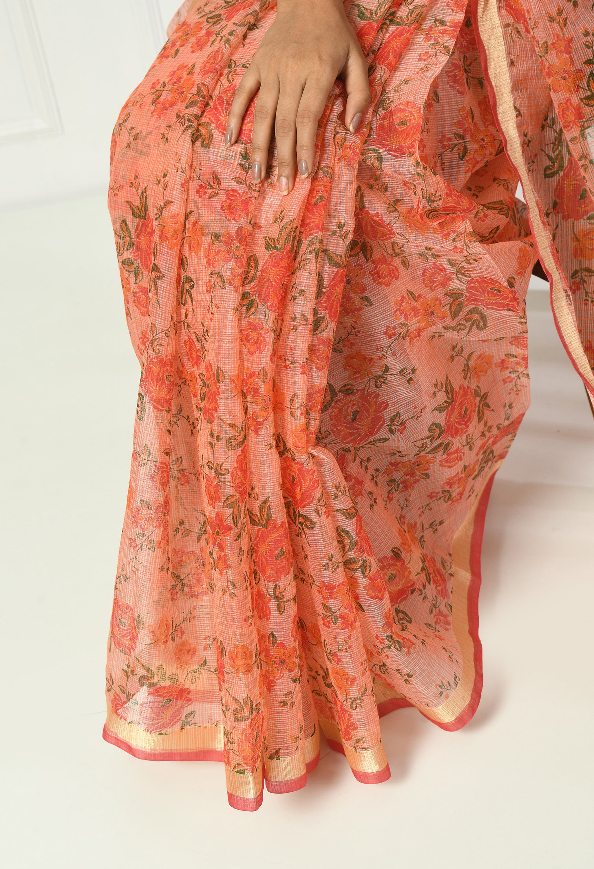 Sunset Orange Cotton Saree with Floral Pattern