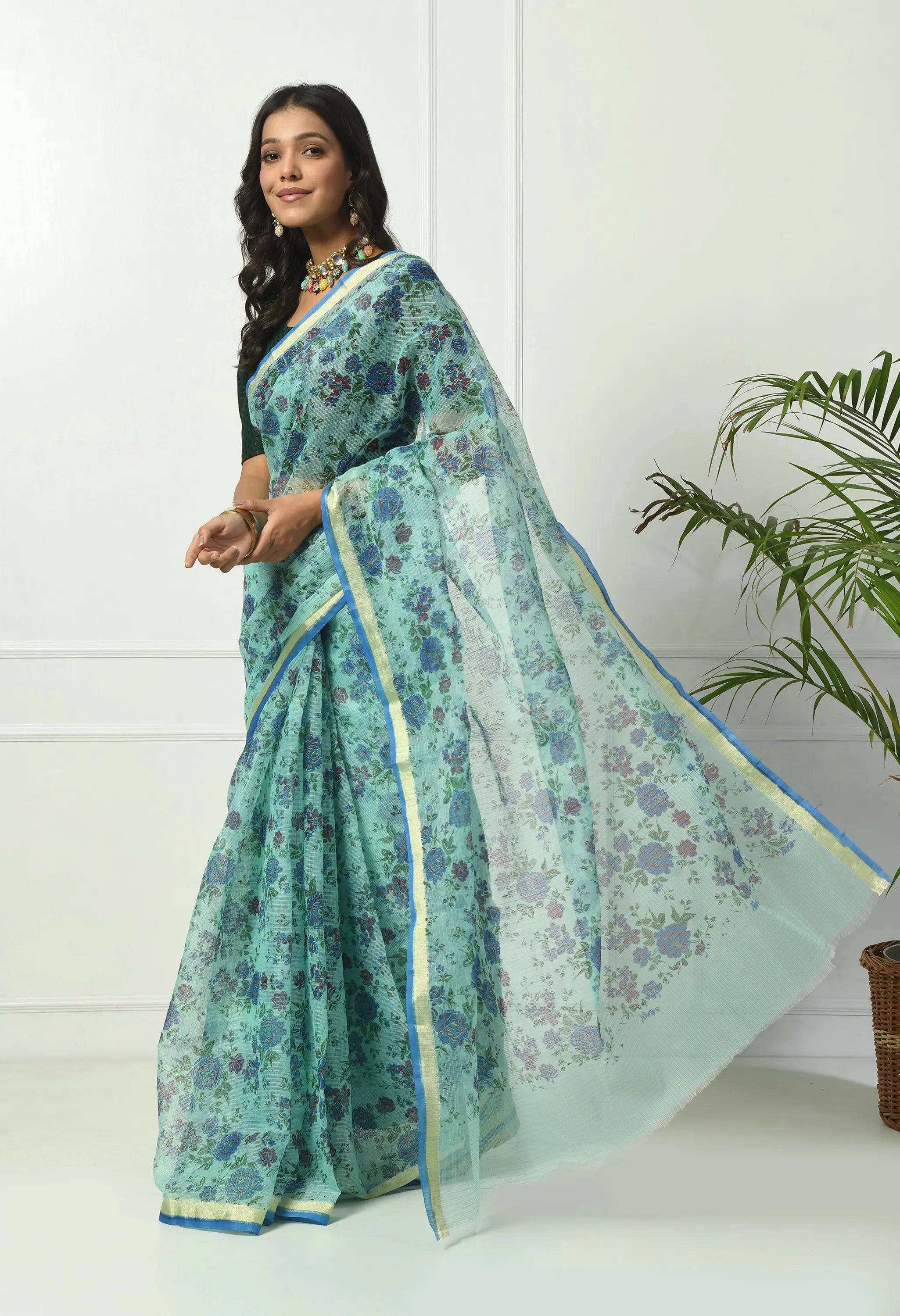 Turquoise Firozi Cotton Saree with Ornate Floral Pattern