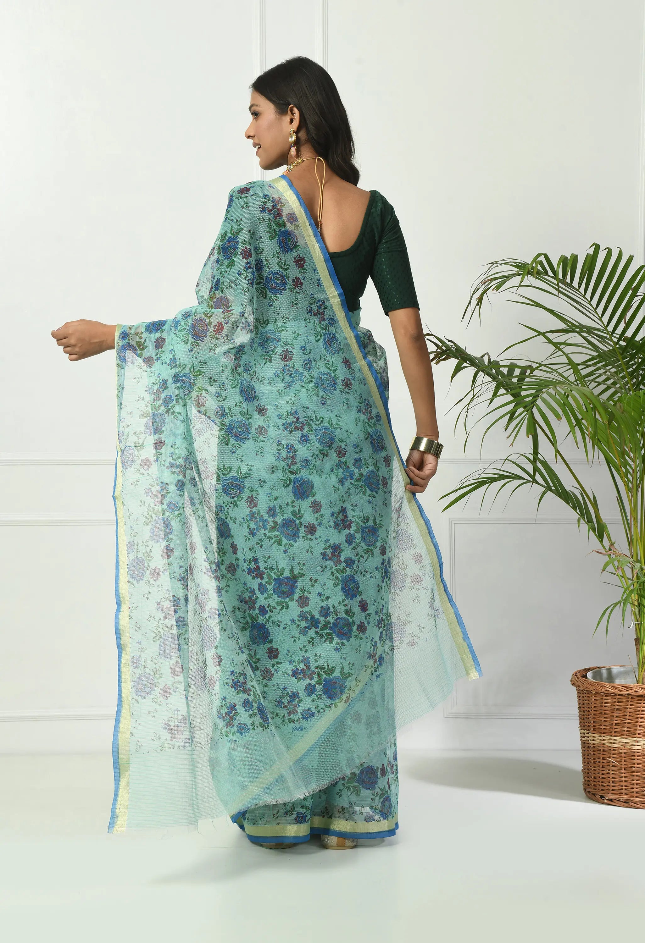 Turquoise Firozi Cotton Saree with Ornate Floral Pattern