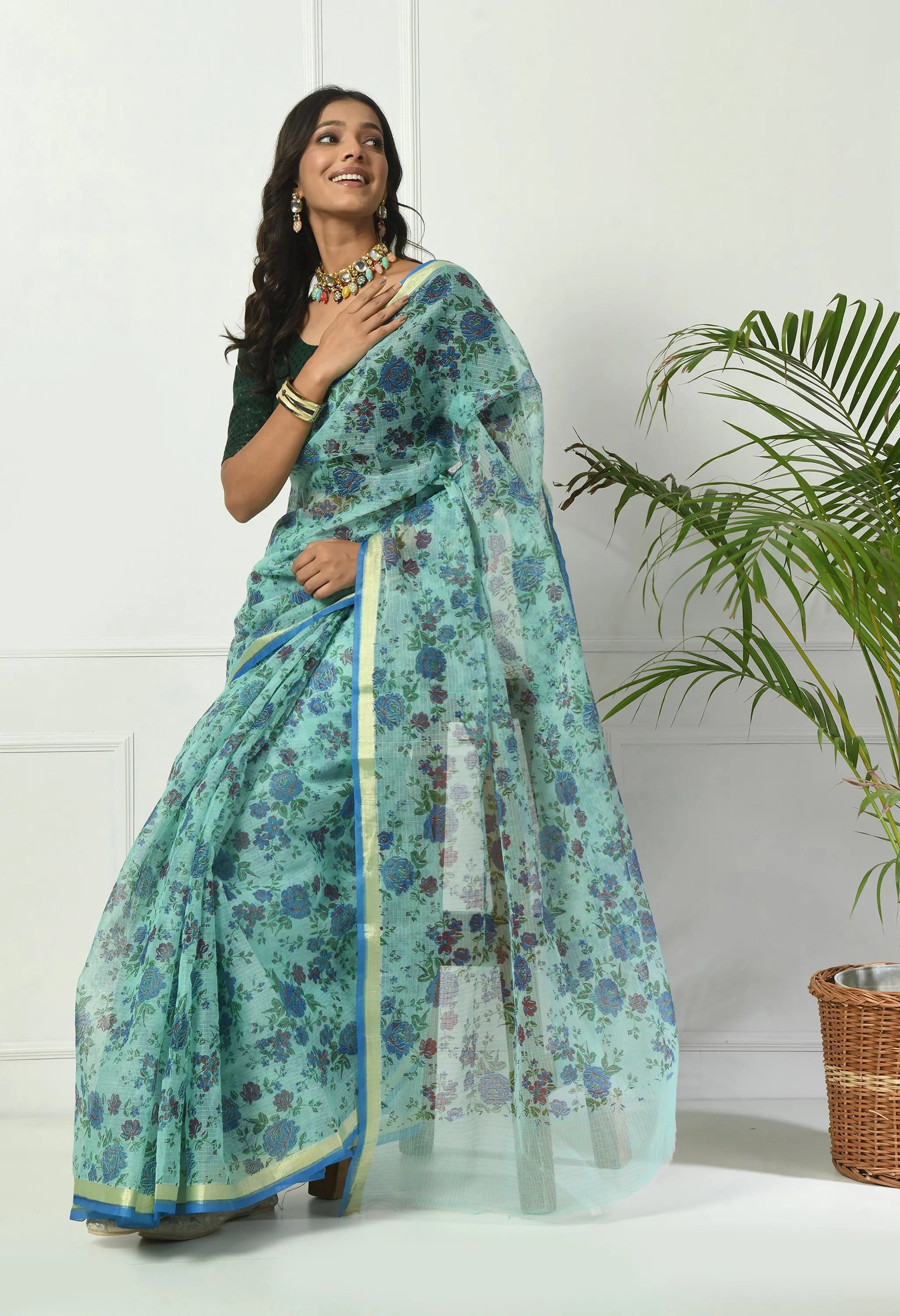 Turquoise Firozi Cotton Saree with Ornate Floral Pattern