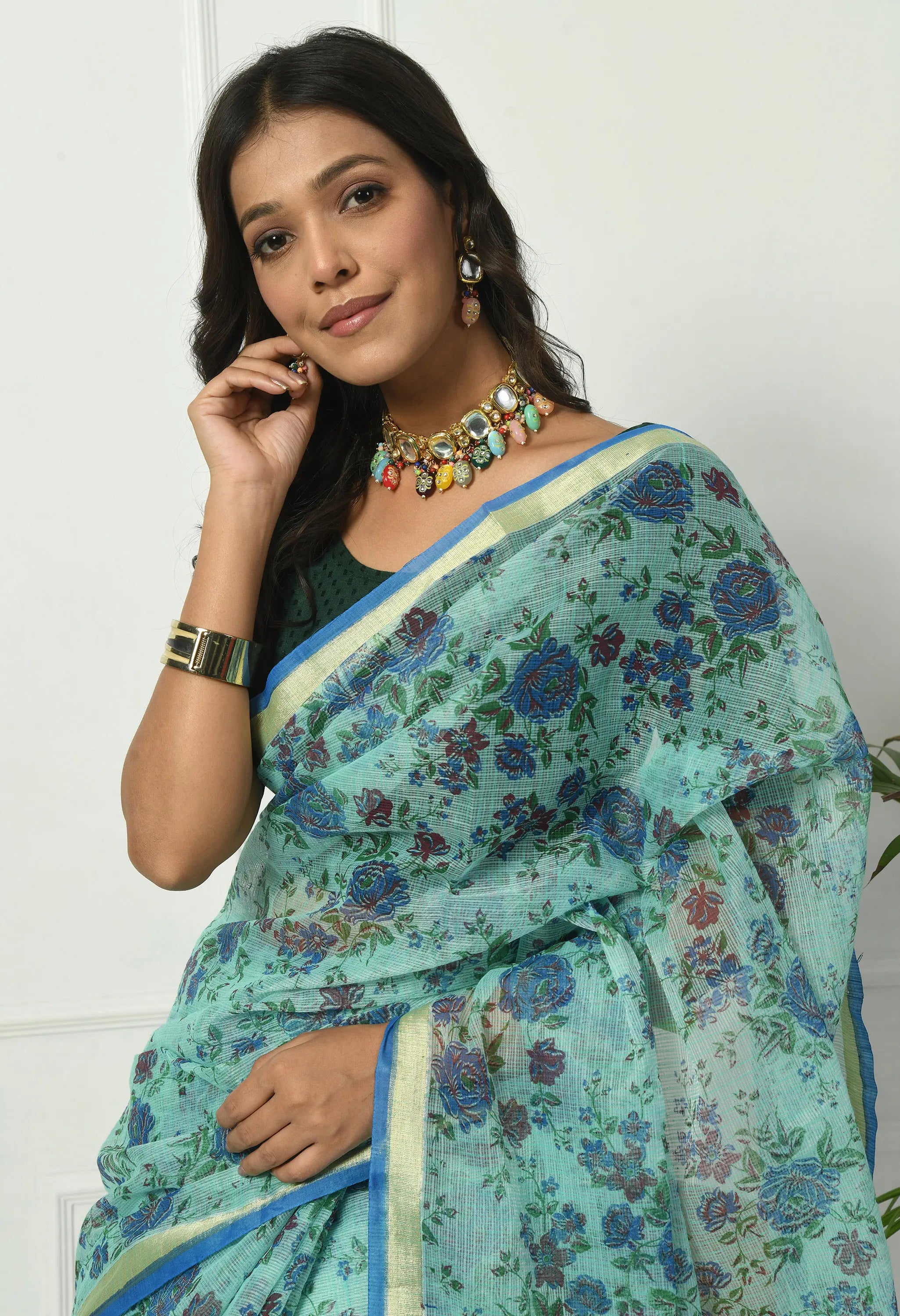 Turquoise Firozi Cotton Saree with Ornate Floral Pattern
