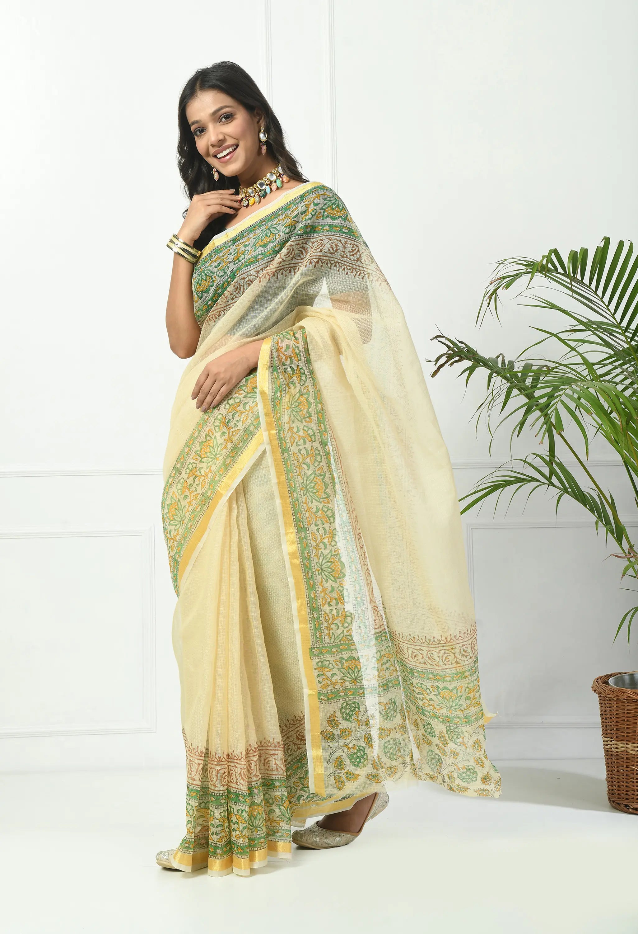 Champagne Yellow Cotton Saree with Chic Floral Border